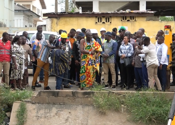 GARID Project: Oppong Nkrumah cuts sod for reconstruction of Nima-Paloma storm drain