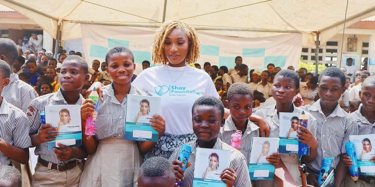 Wendy Shay donates to Manhean M/A Basic School on World Children’s Day